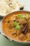 Indian Meal Food Curry Lamb Rogan Josh Naan Bread Vertical