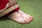 Indian Mehndi painting on the foot feet girls