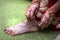 Indian Mehndi painting on the foot feet girls