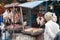 Indian men sell chicken on Russell Market in Bangalore