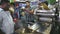 Indian men selling drinks made out of a local plant at shop in Mumbai.