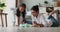 Indian mom and little daughter play tea party at home