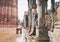 Indian moon season - young tourist man waits intense rain in Qutb Minar, New Delhi