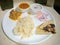 Indian Nonveg Thali rice,meet, roti,Carri and onion..