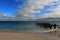 Indian ocean, sky and emerald green ocean with old jetty