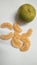 Indian orange fruit with pulp white background