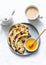 Indian paratha flatbread with honey and masala tea on light background, top view