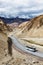 Indian passenger bus on highway in Himalayas. Ladakh, India