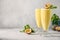 Indian Passion Fruit Lassi on gray background