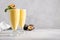 Indian Passion Fruit Lassi on gray background