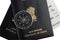 Indian passports, magnetic compass, boarding pass