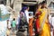 Indian people brings offerings to Nandi Bull at Virupaksha Temple