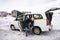 Indian people use chains tied at tire wheels car for protect slip on driving while drive on snow covered road Leh Ladakh in India