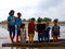 indian poor childrens learning about laptop education on the sailing boat in india January 2020