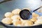 Indian popular snacks food Kachauri being fried at street side shop