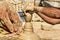 Indian potter making clay pots on pottery wheel in Bikaner. India