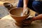 Indian potter at work, Shilpagram, Udaipur, Rajasthan, India