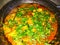 Indian punjabi style home-made matar paneer curry recipe made using cottage cheese with green peas, served in a bowl.