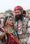 Indian Rajasthani couple in national clothes poses for a photo during Camel Festival in Rajasthan, India