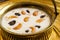 Indian Rice pudding payasam decorated with Cashews and raisin