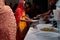 Indian sikh women take their lunch in their temple during Baisakhi celebration in Mallorca