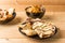 Indian snacks samosa garlic naan bread butter chicken on wooden table