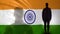 Indian soldier silhouette standing against national flag, proud army sergeant