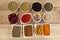 Indian Spices and their Freshly Ground Powders Arranged in Pairs