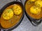 An Indian spread of spicy Egg curry or Egg Masala in a bowl