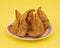 Indian Street Food Samosa or Samosas is a Crispy And Spicy Triangle Shape Snack