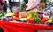 Indian street food vendor selling spicy chickpea bengal gram chole mixture garnished with freshly cut onion,cucumber chilli and