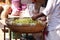 Indian street market stall with basket of lemon for sell