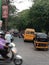 Indian Street : School bus, auto rickshaw, scooters all together