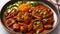 Indian style meat dish in a copper bowl