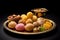 Indian sweets in a plate includes Gulab Jamun, Rasgulla, kaju katli, morichoor Bundi Laddu, Gujiya or Karanji for diwali