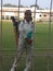 Indian teenager girl standing with cricket kit at old VCA ground,Nagpur