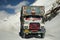 Indian and tibetan drive car and truck on Khardung La Road in Himalaya mountain at Leh Ladakh in Jammu and Kashmir, India