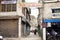 Indian and tibetan people walking and bike bicycle on street in small alley of Leh main bazaar at Leh Ladakh village on March 19,