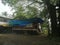 Indian traditional styled truck lorry parked under a tarpolin sheet