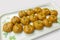 Indian traditional sweet besan ladoo in a beautiful tray