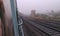 Indian train view from gate in the morning, full of fog