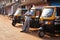 Indian Tuk-Tuk driver waits for customers