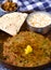 Indian vegetarian meal with pickle papad and yogurt raita