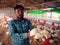 an indian village farmer presenting hen birds around poultry farmhouse area in india dec 2019