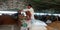 an indian village farmer seating upon wheat sacks at food corporation center