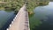 Indian village river between farm with a bridge drone view