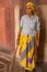 Indian woman with a broom standing inside Humayun\'s Tomb, Delhi,