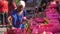 Indian woman burn incense stick with light from lotus candle