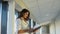 Indian woman physician or nurse professional general practitioner posing with stethoscope in medical office