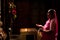 Indian woman prays inside Meenakshi Temple. India